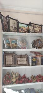 a refrigerator filled with lots of different items at Bilol Guest House in Samarkand