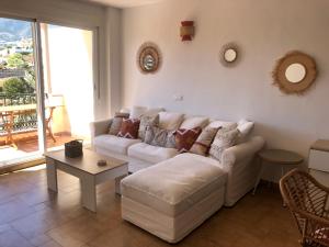 Posezení v ubytování Duplex Penthouse "Playa Y Palmeras"