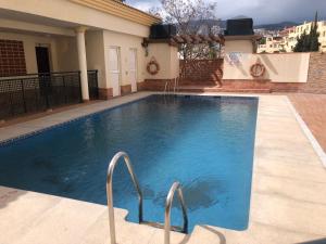 Bazén v ubytování Duplex Penthouse "Playa Y Palmeras" nebo v jeho okolí