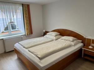 Postel nebo postele na pokoji v ubytování Hotel Altneudörflerhof