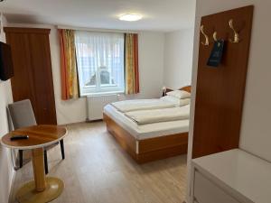 Postel nebo postele na pokoji v ubytování Hotel Altneudörflerhof