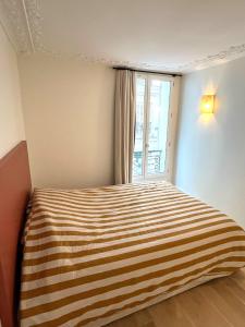 Zdjęcie z galerii obiektu Appartement d'architecte au cœur de Paris 9 w Paryżu +18 zdjęć