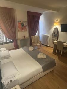 Кровать или кровати в номере Honey Rooms Ferrara