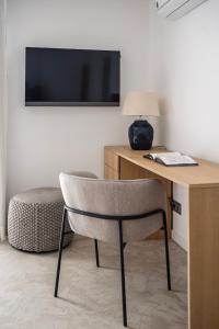TV a/nebo společenská místnost v ubytování Casa Malìa Luxury Guest House