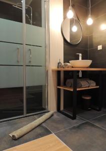 Baðherbergi á Céshap - Chambres d'hôtes avec Jacuzzi