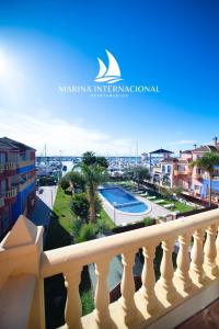 a view of the pool from the balcony of a apartment at Apartamentos Marina Internacional in Torrevieja