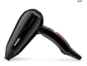 a black hair dryer on a white background at Havre de paix in Coulaines