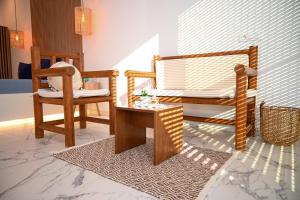 Postel nebo postele na pokoji v ubytování Platanos Apartments