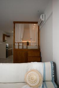 Postel nebo postele na pokoji v ubytování Platanos Apartments