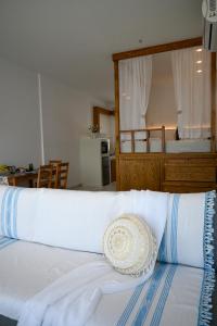 Postel nebo postele na pokoji v ubytování Platanos Apartments