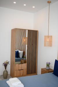 Postel nebo postele na pokoji v ubytování Platanos Apartments