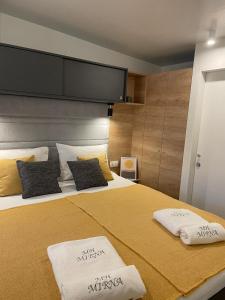 Postel nebo postele na pokoji v ubytování mobile home MIRNA
