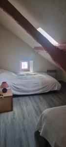 Postel nebo postele na pokoji v ubytování Maison de montagne en pleine nature face au Mont Valier