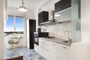 Kjøkken eller kjøkkenkrok på Allianz House - Panoramic San Siro cozy house