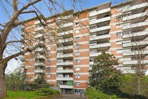 an apartment building with balconies on the side of it at Allianz House - Panoramic San Siro cozy house in Milan