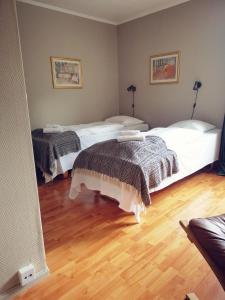 Postel nebo postele na pokoji v ubytování Vertshuset Fannarheimr - Bed &Breakfast