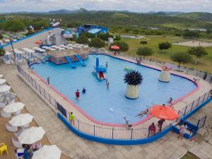 a large swimming pool at a water park at Pousada Agreste Water Park in Caruaru