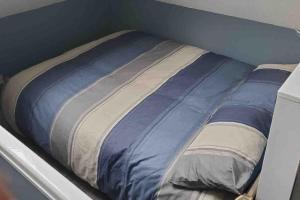 Cama ou camas em um quarto em Tiny one bedroom house