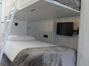 En eller flere senger på et rom på Ideal per una escapada