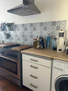 Nhà bếp/bếp nhỏ tại Appartement de vacances +2 ảnh