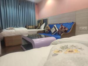 Voodi või voodid majutusasutuse Express Myagdi Hotel Pvt Ltd toas