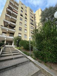 a building with stairs in front of a building at RAHIMA GUEST HOUSE in Rome