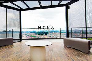 Istumisnurk majutusasutuses Double Storey Pool at Trio Setia by HCK