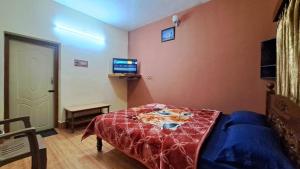 Postel nebo postele na pokoji v ubytování SoNa holidays Inn + 5 fotografií
