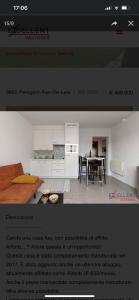 strona internetowa kuchni ze stołem w pokoju w obiekcie Appartamento confortevole w mieście Deinze