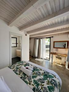 Postel nebo postele na pokoji v ubytování MAYANA SICILY - The suites