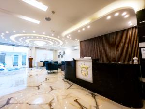 a lobby with a waiting room with a reception desk at Petra Premium Hotel in Wadi Musa