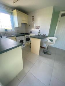 Kuchyň nebo kuchyňský kout v ubytování Ceecliff flat