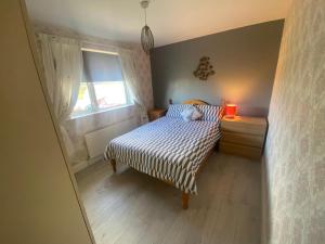 Postel nebo postele na pokoji v ubytování Ceecliff flat
