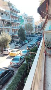 a group of cars parked on a city street at private room in the heart of Athens 2 in Athens