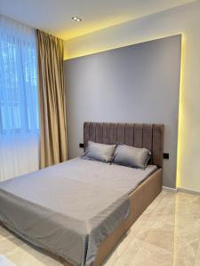 Postel nebo postele na pokoji v ubytování Soho + 10 fotografií