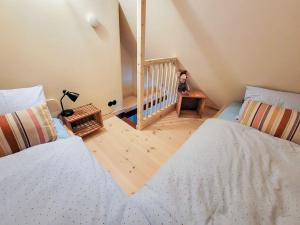 Postel nebo postele na pokoji v ubytování Møllehusets Bed & Breakfast