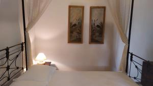 A bed or beds in a room at Almond trees house