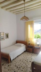 A bed or beds in a room at Almond trees house