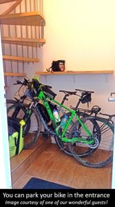 two bikes parked next to each other in a room at L'appart d'Avignon in Avignon