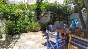 A garden outside Almond trees house