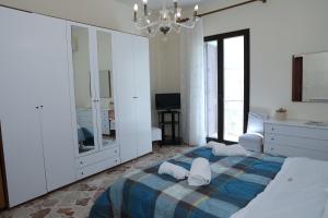 Posteľ alebo postele v izbe v ubytovaní Casa Mia, vacanze