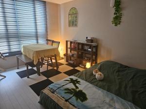 Χώρος καθιστικού στο Daegu Business Star BnB