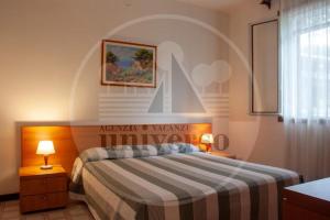 Postel nebo postele na pokoji v ubytování Villa Braies