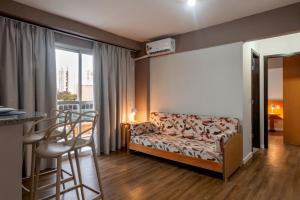 Postel nebo postele na pokoji v ubytování Lym Flat Hotel