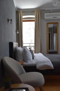 Ένα ή περισσότερα κρεβάτια σε δωμάτιο στο Residence Dream