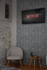 TV a/nebo společenská místnost v ubytování Residence Dream + 52 fotografií