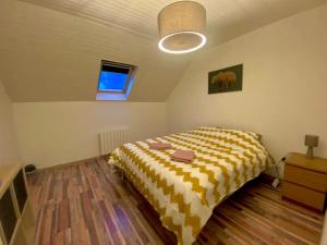 Postel nebo postele na pokoji v ubytování Maison Allemond pour Alpe d'Huez