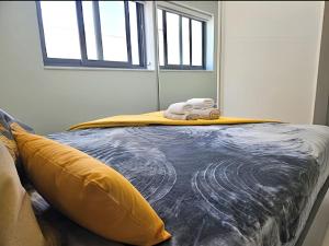 Postelja oz. postelje v sobi nastanitve Diamond Seaview Apartment