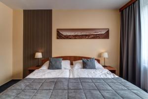 Posteľ alebo postele v izbe v ubytovaní LC - Hotel Ostrava