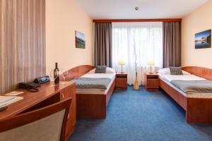 Posteľ alebo postele v izbe v ubytovaní LC - Hotel Ostrava